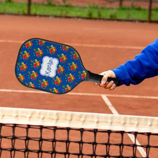 Funny SuperPickleman on Blue Personalised Pickleball Paddle (Fun Pickle People fly through the sky, their rackets close at hand!)