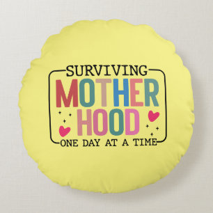 Funny surviving Motherhood word art  Round Cushion