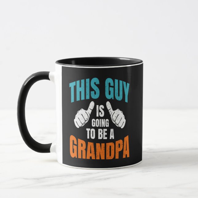 Funny This Guy Is Going To Be A Grandpa Mug (Left)