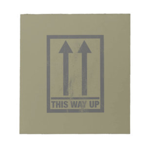 Funny this way up sign notepad