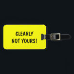 Funny travel luggage tag | Clearly not yours!<br><div class="desc">Funny travel luggage tag | Clearly not yours! Personalised labels for bags and suitcases. Cute quote for travelers. Personalizable text and colours. Bright yellow example.</div>