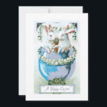 Funny Vintage Easter Bunnies in Egg Holiday Card<br><div class="desc">Whimsical vintage greeting card lithographic art featuring two white Easter bunnies in a dyed blue egg surrounded by lily-of-the-valley and clover with happy Easter greeting.</div>