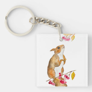 Funny watercolor squirrel on a branch with berries key ring