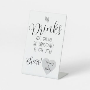 Funny Wedding Bar Sign – “The Drinks Are On Us” 