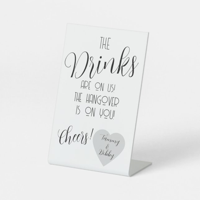Funny Wedding Bar Sign – “The Drinks Are On Us”  (Front)