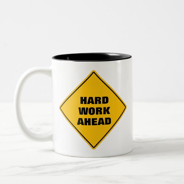 Funny yellow hard work ahead caution road sign Two Two-Tone Coffee Mug (Left)