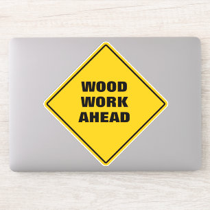 Funny yellow wood work ahead caution road sign 