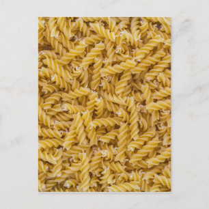 Fusilli pasta macro as background structure postcard