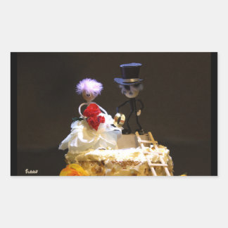 Fuzzy bride and groom on cake. rectangular sticker