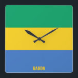 Gabon Flag Dazzling Patriotic Square Wall Clock<br><div class="desc">Gabon Flag Dazzling Patriotic Square Wall Clock in the colors and the elements of the Gabon national flag covering the front of the clock. National flag colors are complemented with the text "Gabon" on the bottom. Text is fully customizable using "Customize it!" feature. Feel free to change it, remove it...</div>
