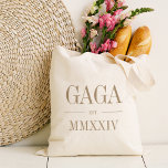 Gaga Grandma Roman Numeral Year Established Tote Bag<br><div class="desc">A modern minimalist tote bag to celebrate a chic grandma,  this clean minimal tote features "Gaga" or your choice of grandma nickname in neutral tan serif lettering. Customise with the year she became a grandmother beneath in elegant roman numerals for a chic touch.</div>