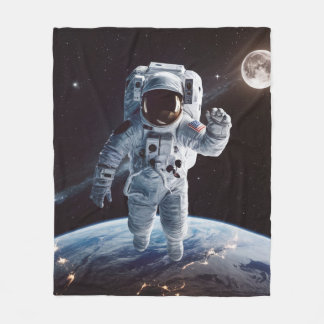 Galaxy Dreams | astronaut floating in space Fleece Blanket