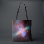 Galaxy M82 Tote Bag<br><div class="desc">This image shows a stunning view of a Starburst galaxy produced by space telescopes. M82 is a galaxy about 12 million light years from Earth that is undergoing a burst of star formation. X-rays from Chandra (blue) show gas being blasted away from the galaxy's disc as a bounty of stars...</div>