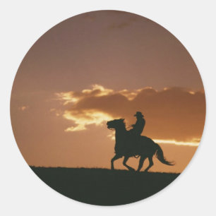 Galloping Cowboy Silhouette Classic Round Sticker