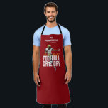 Game On Football Player Red Apron<br><div class="desc">Football game day apron features a football player on a red background and the words "Are You Ready, " Football Game Day, " and your family name at the top. You can change the black colour to your team colour with our edit tools. MATCHING items in our collection.</div>