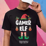 Gamer elf fun ironic Christmas family outfit name T-Shirt<br><div class="desc">This amusing self-ironic gamer elf t-shirt, which is a part of a matching family elf clothing collection with gifts for every family member, will help you get into the holiday mood. Perfect for any Christmas family gathering, this t-shirt features a cute elf hat and fun legs, with the caption "Gamer...</div>