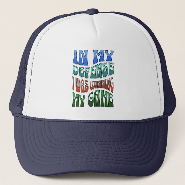 Gamer That is Always Late Shirt, In My Defense Trucker Hat (Front)