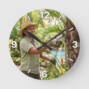 Gardener Woman Pruning Palm Tree Decor Round Clock