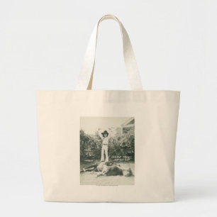 Garlene Tindall standing on a trick horse. Large Tote Bag