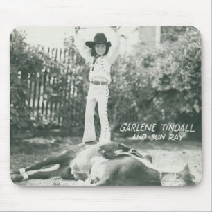 Garlene Tindall standing on a trick horse. Mouse Mat