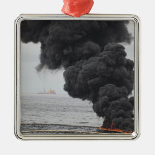 Gathered concentrated oil burns metal tree decoration