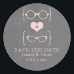 Geeky Glasses Chalkboard Save the Date Stickers<br><div class="desc">Quirky and chic Geeky Glasses Chalkboard Save the Date Stickers in light pink featuring a cute heart flanked by two pairs of nerdy eyeglasses, a manly pair and a girly pair representing the groom and bride on a chalkboard look background. These offbeat save the date stickers are perfect for announcing...</div>