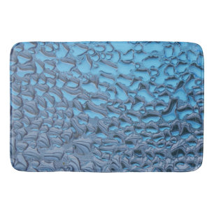 Gentle raindrops on blue glass   bath mat