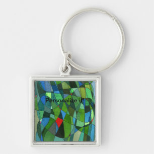 Gently curved shapes in cool greens & red accents key ring