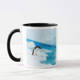 gentoo penguin, Pygoscelis Papua, jumping off Mug