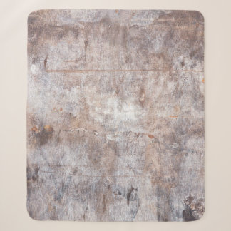 Genuine vintage washouts on the wooden surfaceaged sherpa blanket
