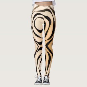Geometric black spiral on reddish colour backgroun leggings