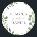 Geometric Greenery Personalised Wedding Classic Round Sticker<br><div class="desc">Designed to coordinate with our Mixed Greenery wedding collection,  this customisable sticker features a gold geometric frame adorned by watercolor greenery foliage with gold and grey text. To make advanced changes,  go to "Click to customise further" option under Personalise this template.</div>