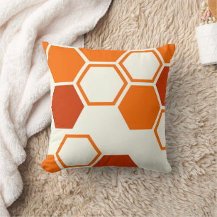Geometric hexagon honeycomb orange cushion
