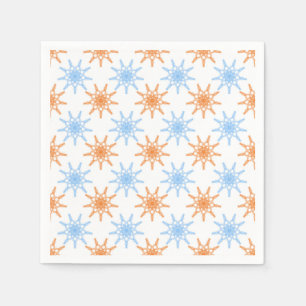 Geometric snowflake pattern in blue and orange napkin