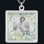 Georgian era woman with Flowers and leaves design Silver Plated Necklace<br><div class="desc">Elevate your style with our exquisite Georgian Woman Art Collage Necklace in a stunning aqua blue and silver palette. This unique piece combines the grace and elegance of Georgian-era portraiture with a contemporary twist, creating a wearable work of art. The intricate collage design captures the timeless beauty of a Georgian...</div>