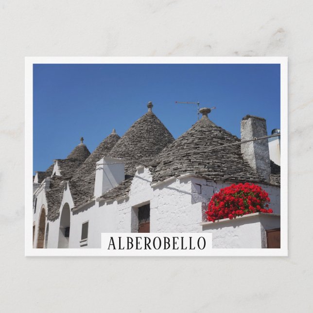 Geranium flowers and trulli houses in Alberobello Postcard (Front)