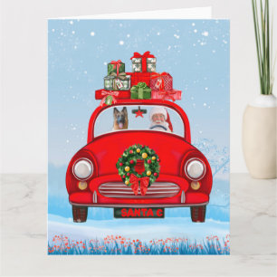 German Shepherd Dog In Car With Santa Claus Card