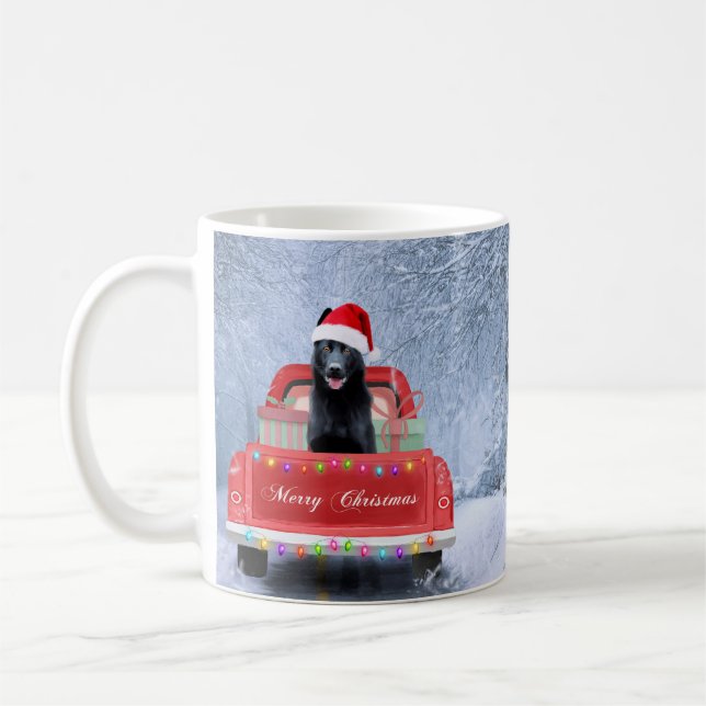 German Shepherd Dog in Snow sitting in Christmas Coffee Mug (Left)