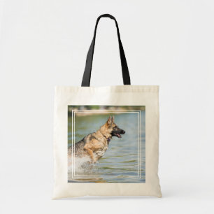 German Shepherd Leaps Into Water Tote Bag