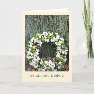 German Sympathy White flower wreath near tree Card
