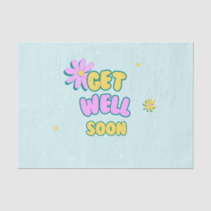 Get well soon bold text with flowers on blue tissue paper