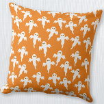 Ghost Halloween Orange Cushion<br><div class="desc">Lots of little white ghosts on an orange background.  A fun pattern for those who like cute and spooky things. Particularly good for Halloween. Original art by Nic Squirrell.</div>