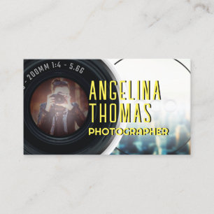 Giant camera lens portrait photo and logo business card