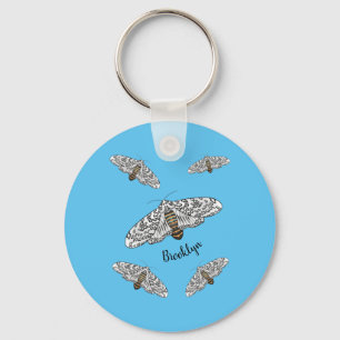 Giant leopard moth cartoon illustration  key ring