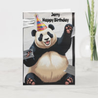 Giant panda sitting up wearing birthday hat