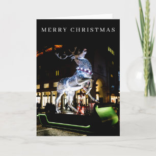 Giant reindeer at night Christmas card