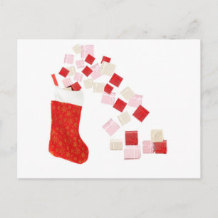 Giftboxes spilling out of a stocking postcard