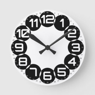 gigantesque negative space numbers round clock