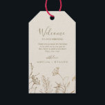 Gilded Floral Cream and Gold Wedding Welcome Gift Tags<br><div class="desc">These gilded floral cream and gold wedding welcome gift tags are perfect for an elegant wedding. The modern boho design features a whimsical arrangement of faux gold foil hand drawn flowers, leaves and botanicals on a cream background. Personalise the tags with the location of your wedding, a short welcome note,...</div>