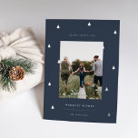 Gilded Forest | Elegant Christmas Photo Foil Holiday Card<br><div class="desc">A modern and elegant Christmas holiday card design featuring a single vertical photo on a navy blue background dotted with silver foil pine trees. Personalise with your custom holiday greeting,  family name and the year beneath.</div>